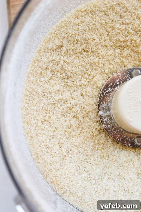 Ina Garten's 1770 House Meatloaf 6 Finely ground panko breadcrumbs in a food processor, showcasing the desired texture for a light and tender meatloaf.