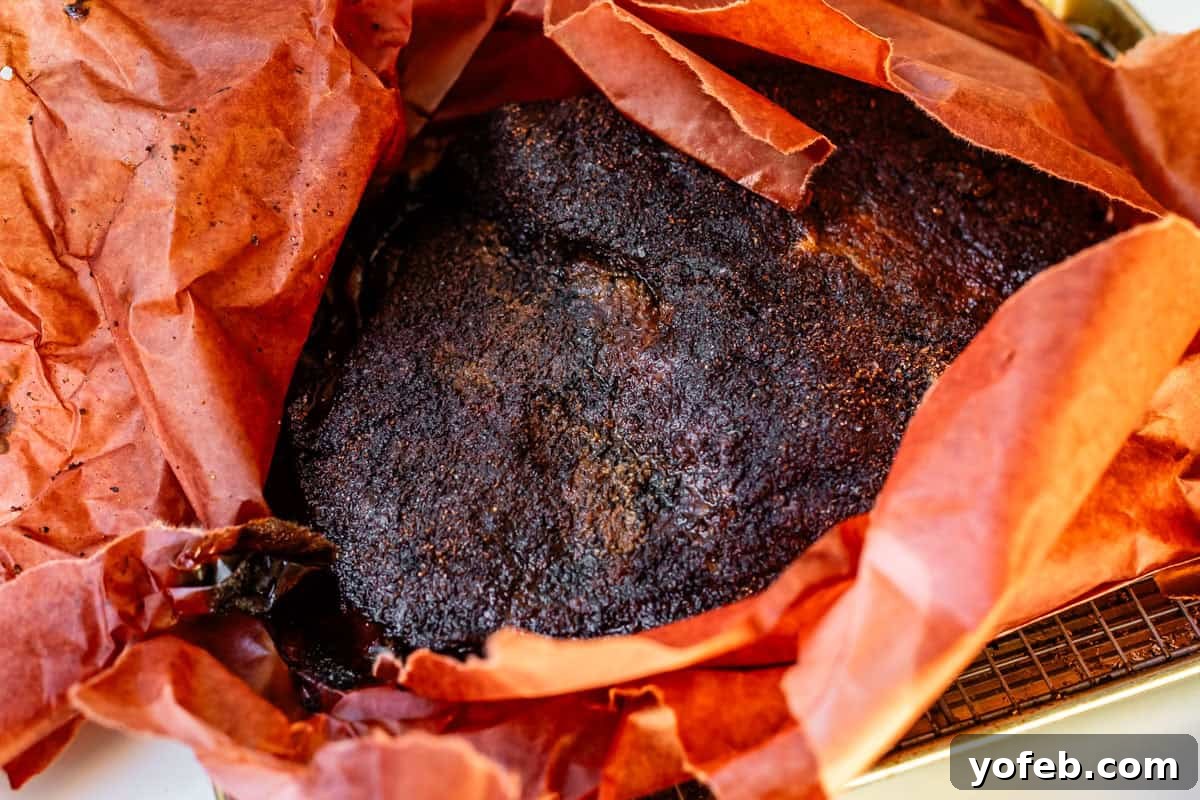 Texas Brisket: Oven-Perfected Tenderness 31 butcher paper all opened up around a finished brisket flat with bark.