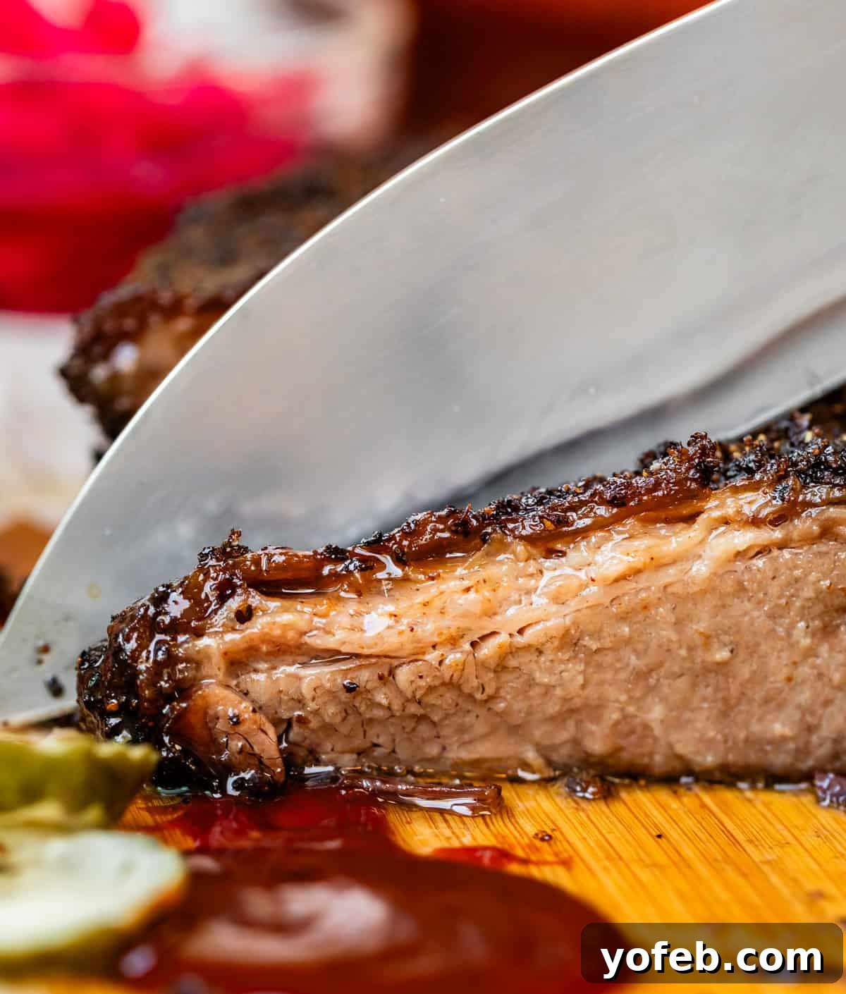 Texas Brisket: Oven-Perfected Tenderness 35 Slicing brisket with chef's knife.