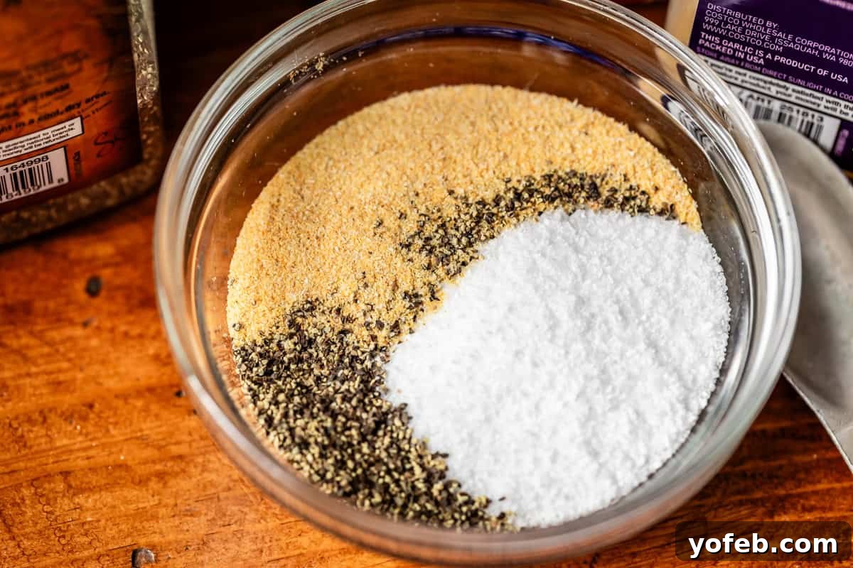 Texas Brisket: Oven-Perfected Tenderness 10 small glass bowl filled with salt, pepper, and garlic granules for the dry brine.