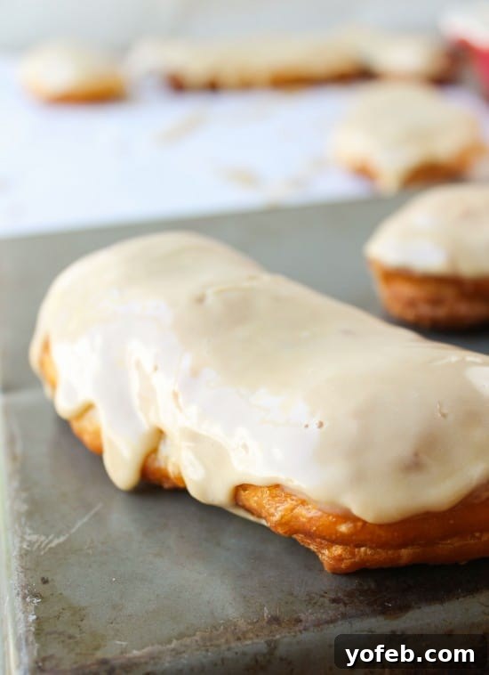 Simple 30-Minute Maple Bars 8 Maple Bars fresh from the fryer, glistening with glaze