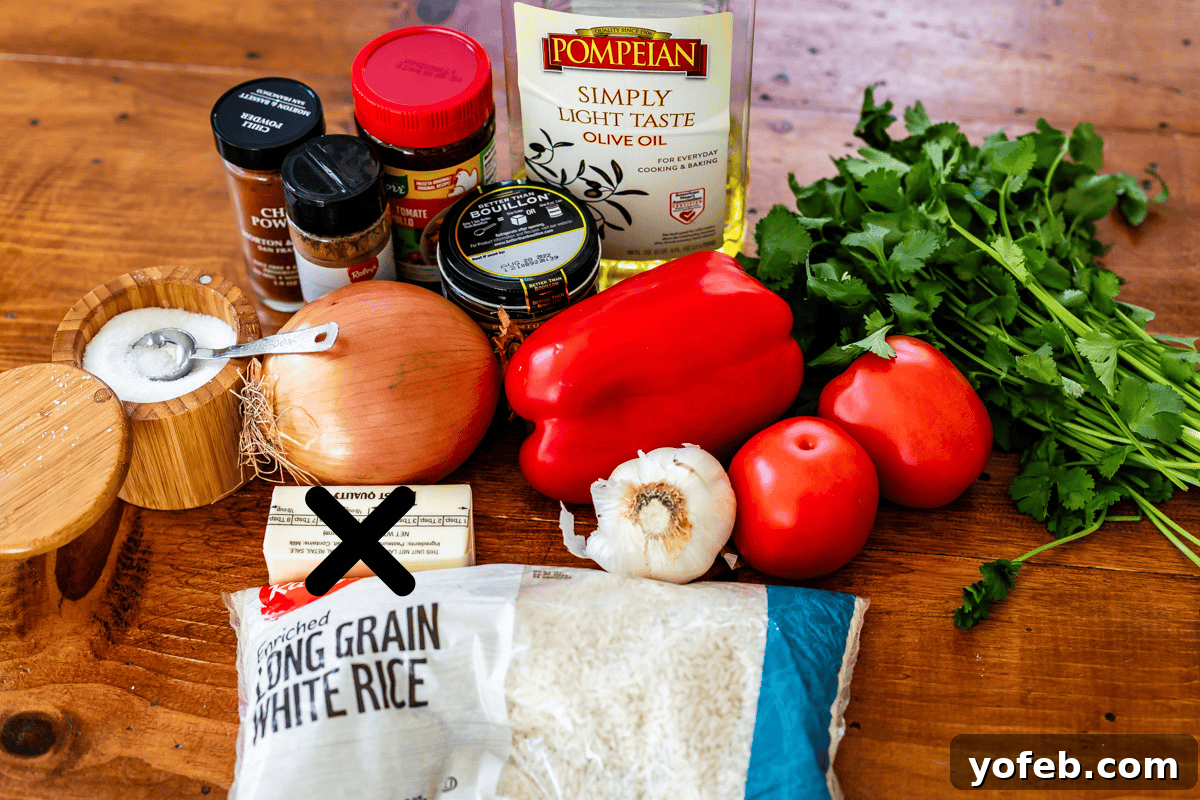 The Ultimate Homemade Mexican Rice 6 ingredients for mexican rice like onion, tomato, rice, bouillon, and more.