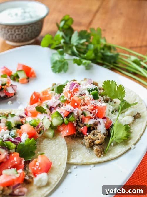 Zesty Greek Lentil Tacos with Cool Cucumber Pico 10 A beautifully assembled Greek Lentil Taco, ready to be enjoyed.