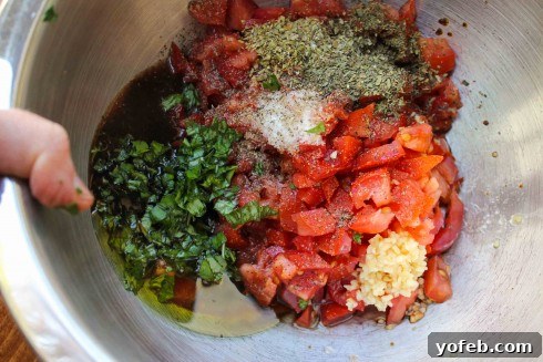 Garden-Fresh Bruschetta with Earthy Lentil Dip 5 Preparing bruschetta topping