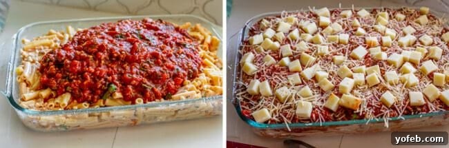 Assembling the Cheesy Baked Ziti Casserole. Layering red sauce over ziti, then topping with cubed mozzarella and Parmesan cheese in a baking pan.
