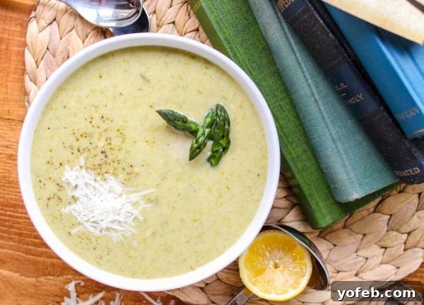 Vibrant Spring Asparagus Puree 6 Close-up of a vibrant bowl of asparagus soup, highlighting its fresh ingredients and creamy texture.