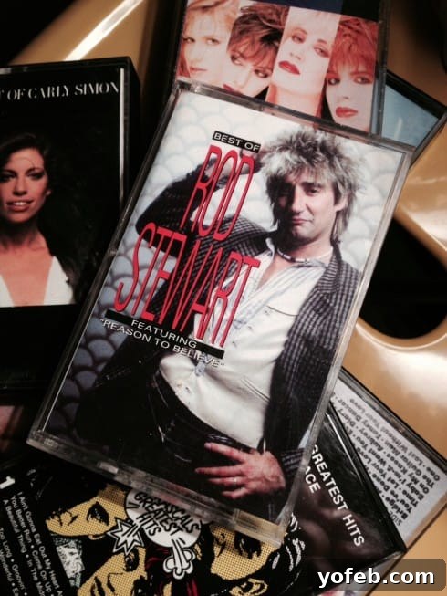 Another view of Rod Stewart cassette tapes on a barstool.