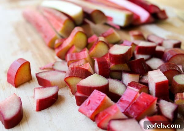 Chopped Rhubarb for Pie Freshly chopped rhubarb stalks, vibrant red and green, ready for pie making.