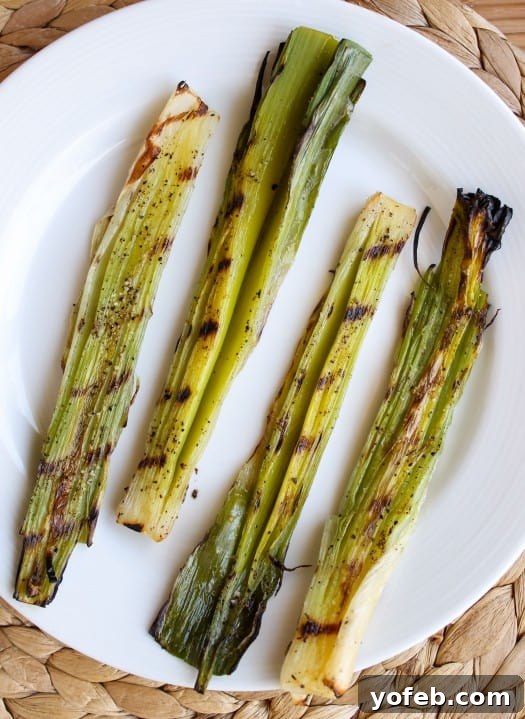 Platter of finished grilled leeks, ready to be served
