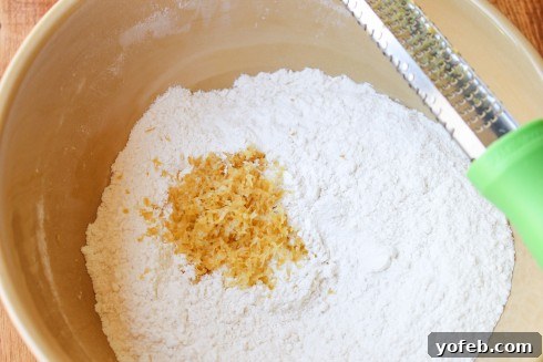 Lemon Berry Bliss 6 Zesting lemon into flour mix for shortcake