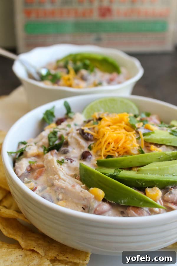 Cream Cheese Chicken Chili ingredients in a slow cooker