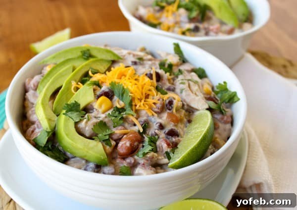 A bowl of Cream Cheese Chicken Chili (Crockpot) ready to be served