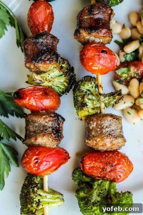 Quick Sausage & Broccoli Skewers with Zesty White Bean Salad 3 Close-up of grilled sausage and broccoli kebabs on skewers
