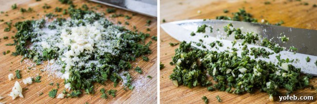 Herbal Roasted Turkey Delights 10 A chef's knife chops fresh sage and garlic finely on a wooden cutting board, preparing the herb butter mixture.