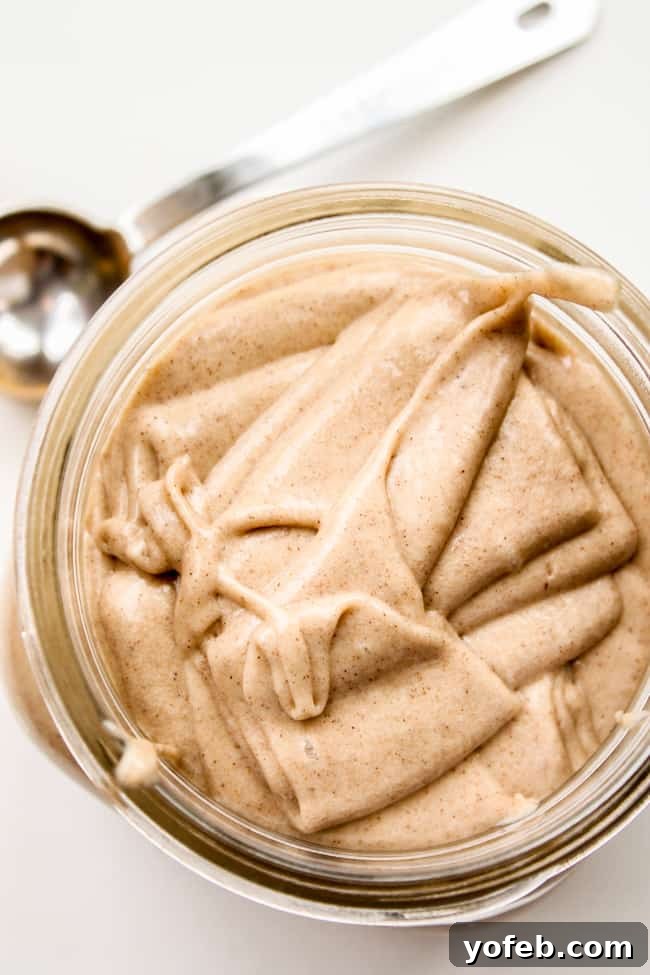 Spiced Honey Butter Delight 2 A beautiful mason jar filled with creamy cinnamon honey butter, ready to be enjoyed or gifted.