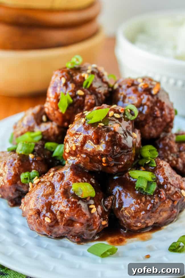 A serving of Raspberry Balsamic Meatballs ready for a holiday gathering.