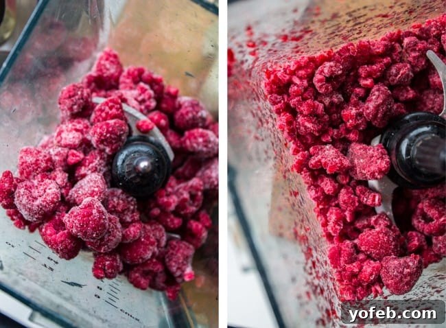 Frozen raspberries, lightly pulsed in a blender, ready to be sprinkled over the sweet roll dough.