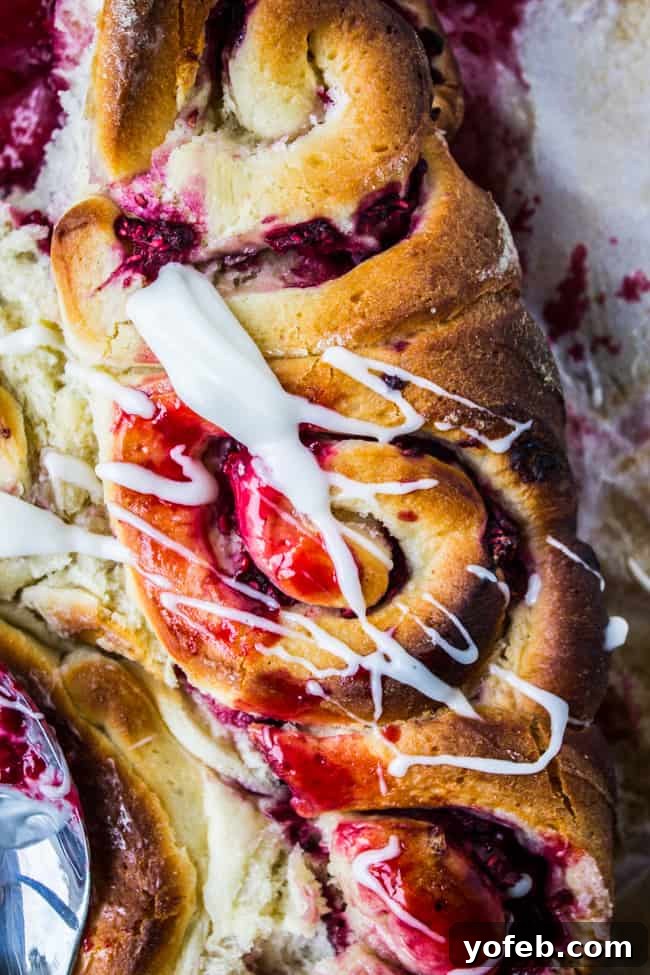 Raspberry Sweet Rolls with Coconut Cream Cheese Frosting