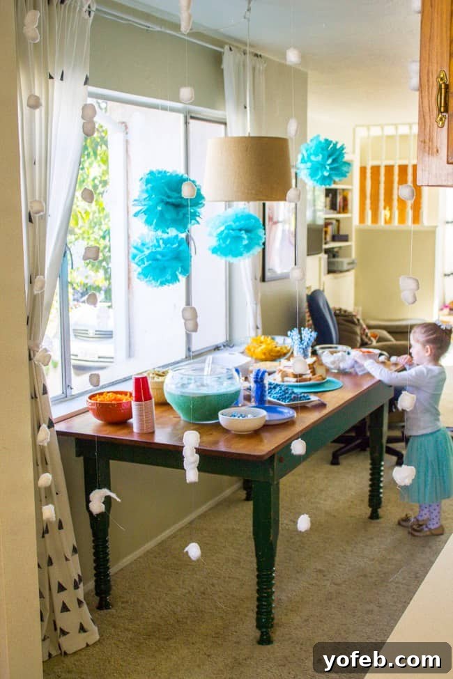 DIY Cotton Ball Snow Decorations for a Frozen Party DIY Cotton Ball Snow Decorations for Frozen Party