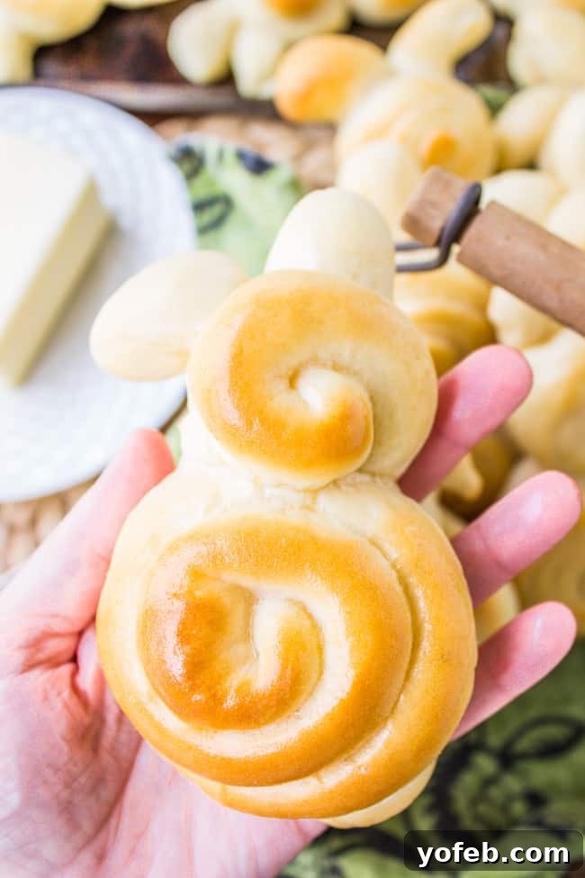 Pillowy Easter Bunny Dinner Rolls 13 A high-quality image of freshly baked Easter Bunny Dinner Rolls, golden and fluffy, perfect for the recipe card.