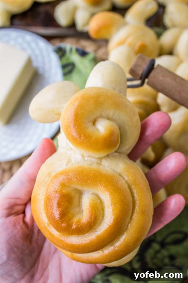 Pillowy Easter Bunny Dinner Rolls 4 A close-up view of a baked Easter Bunny Dinner Roll, showcasing its golden crust and cute shape, ready to be enjoyed.
