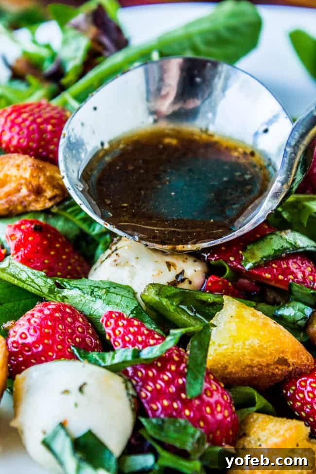 Refreshing Strawberry Panzanella 3 Close-up of fresh strawberries and basil in Strawberry Panzanella Salad