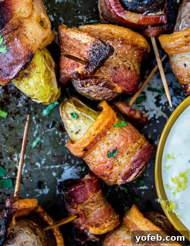 Crispy Bacon Potato Bites 5 Batch of Bacon Wrapped Potatoes on Baking Sheet
