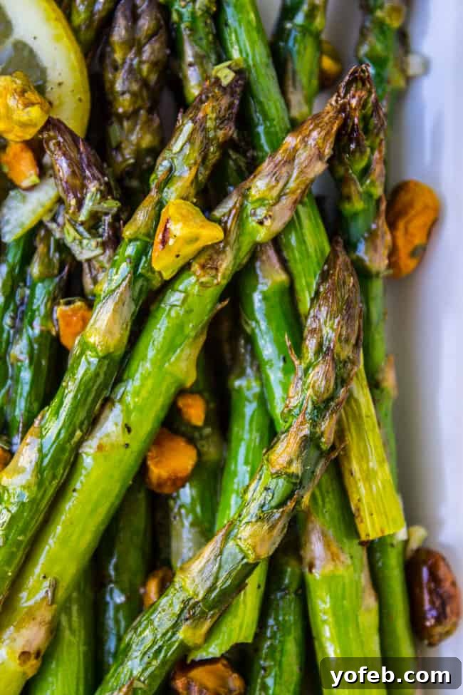 Zesty Asparagus with Pistachio Crunch 2 Lemon Asparagus with Pistachios from The Food Charlatan