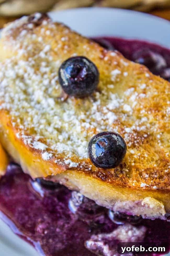 Blueberry Bliss Overnight French Toast Bake 5 The blueberry layer of the casserole, vibrant and ready for the French toast topping
