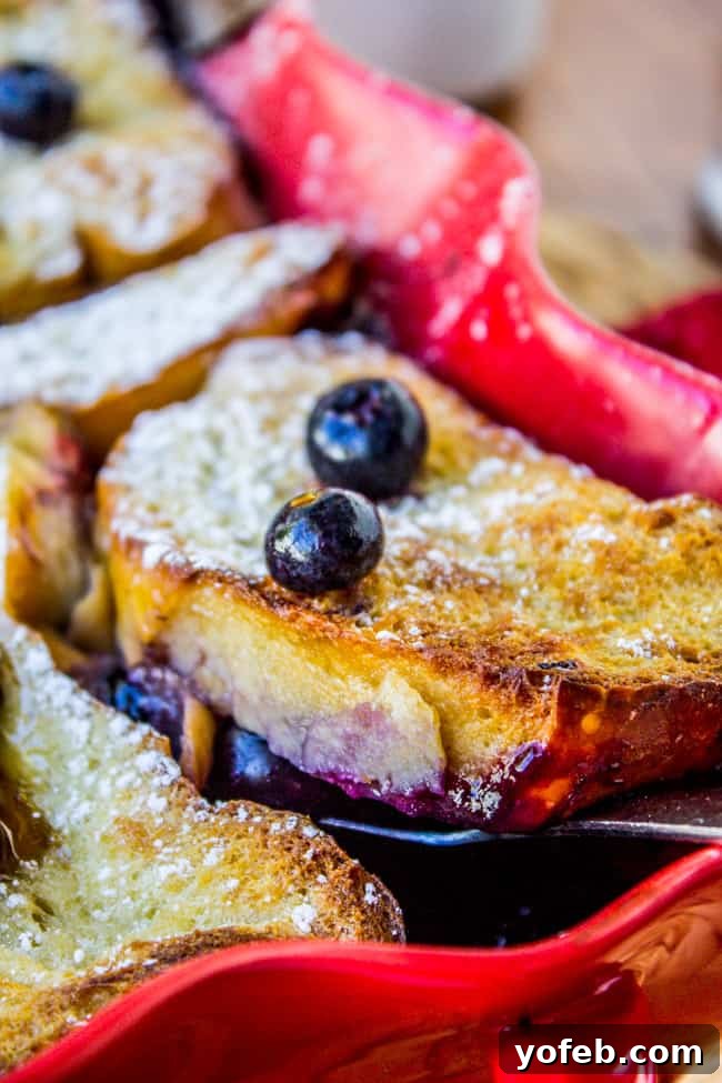 Blueberry Bliss Overnight French Toast Bake 6 Overnight Blueberry French Toast Casserole, showcasing the rich blueberry bottom and golden French toast top