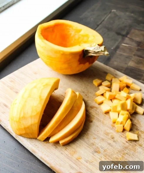 Chopping pumpkin into cubes