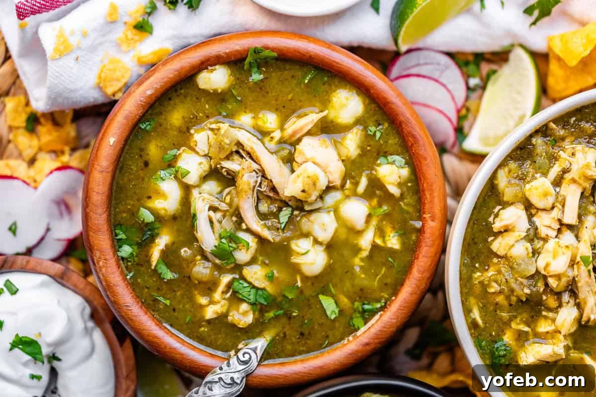 Vibrant Green Chicken Pozole in Minutes 21 A bowl of soup with meat and vegetables.