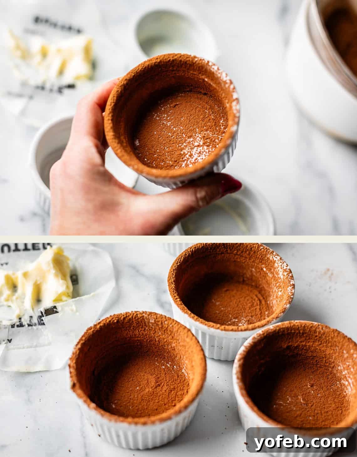 Molten Chocolate Magic 18 A hand holds a small white ramekin coated with cocoa powder. Below, two more ramekins are similarly coated, sitting on a marble surface near a butter wrapper and a stick of butter.