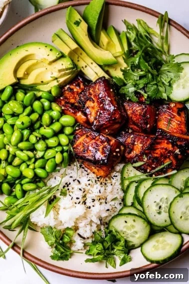 Chili-Lime Blackened Salmon 16 Ceramic dinner bowl with sushi rice, blackened salmon, cucumber, edamame, and more.